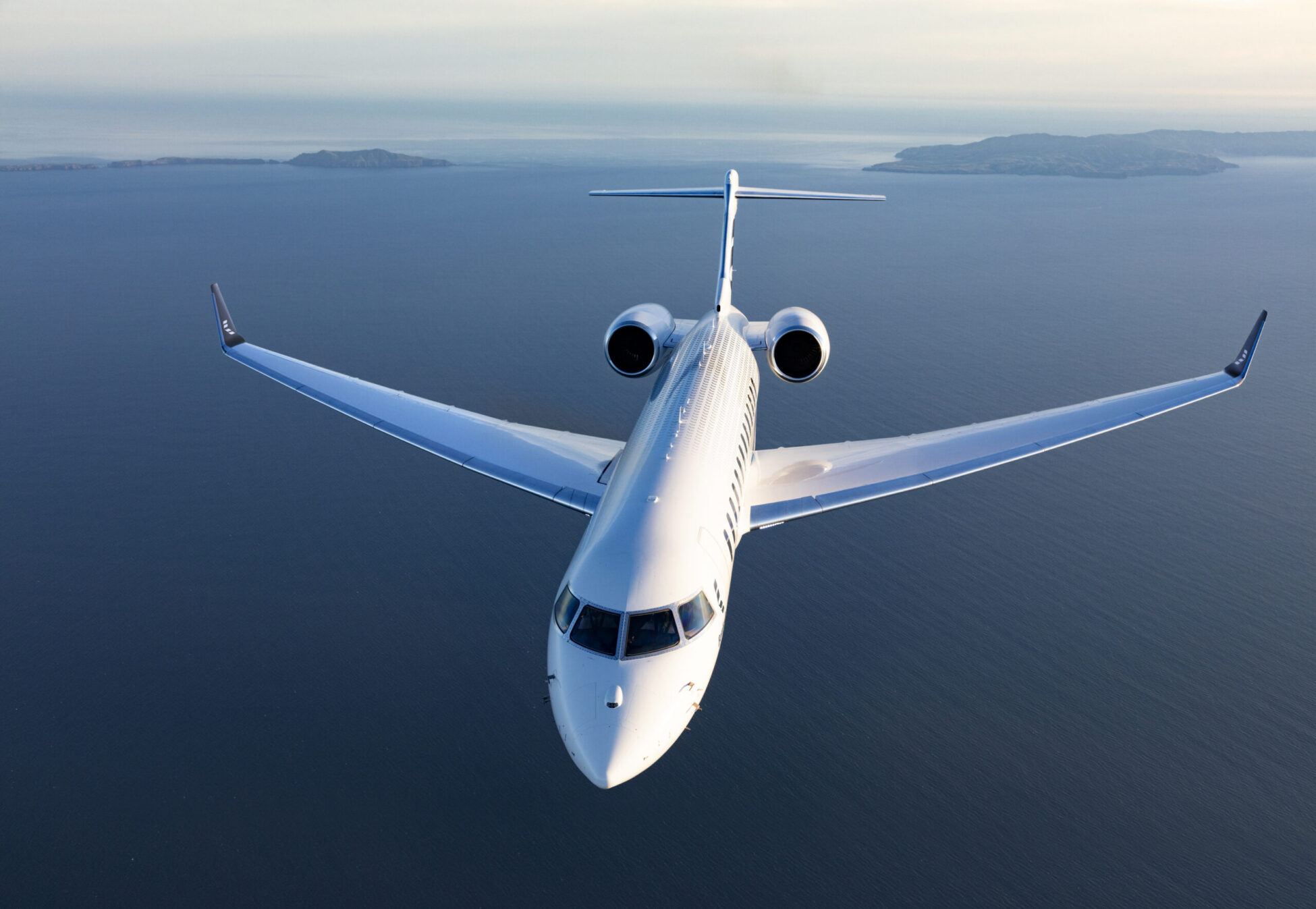 Bombardier Global 7500 flying above the sea